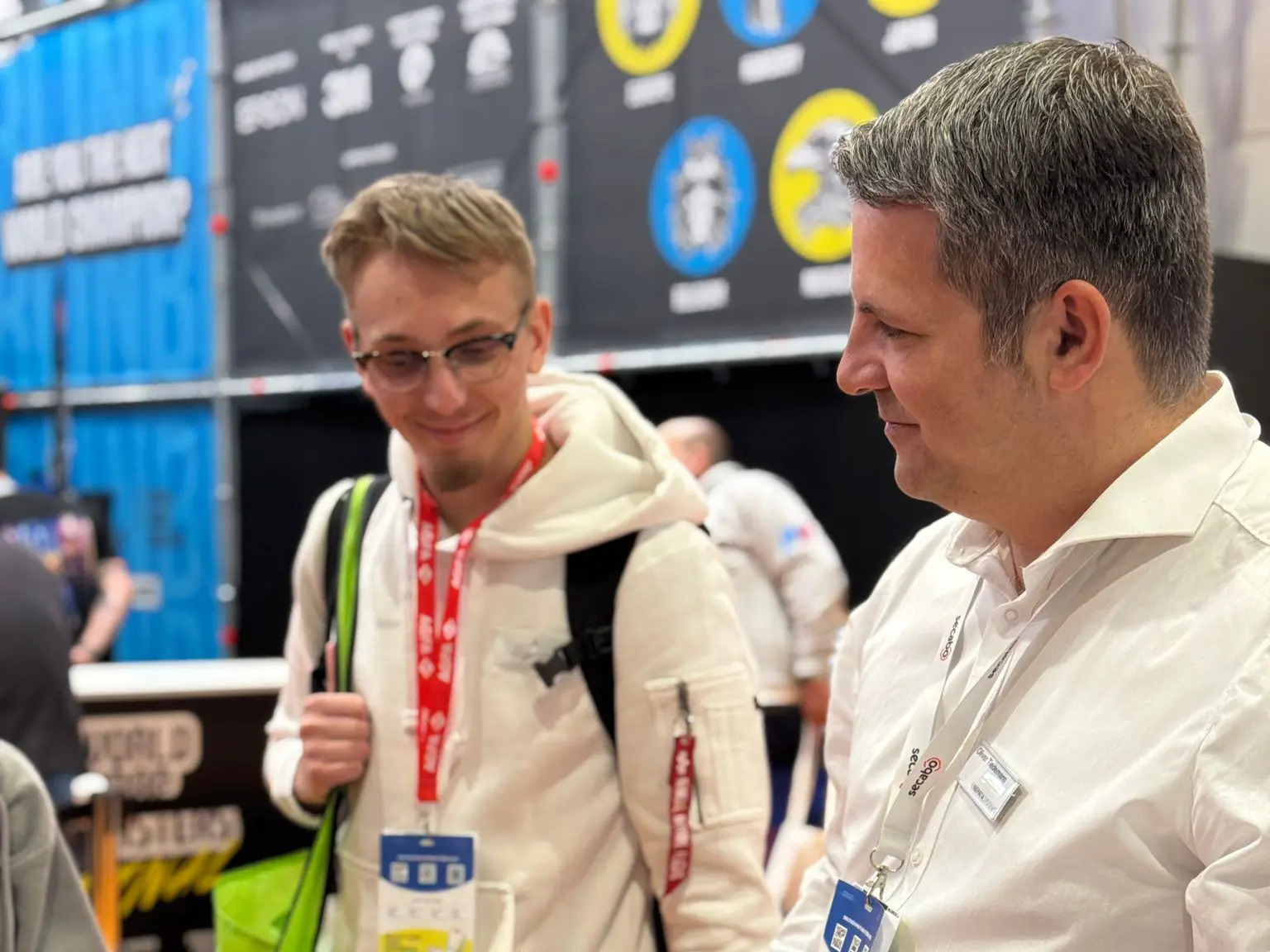 Business meeting and consulting at trade show - OT Consulting